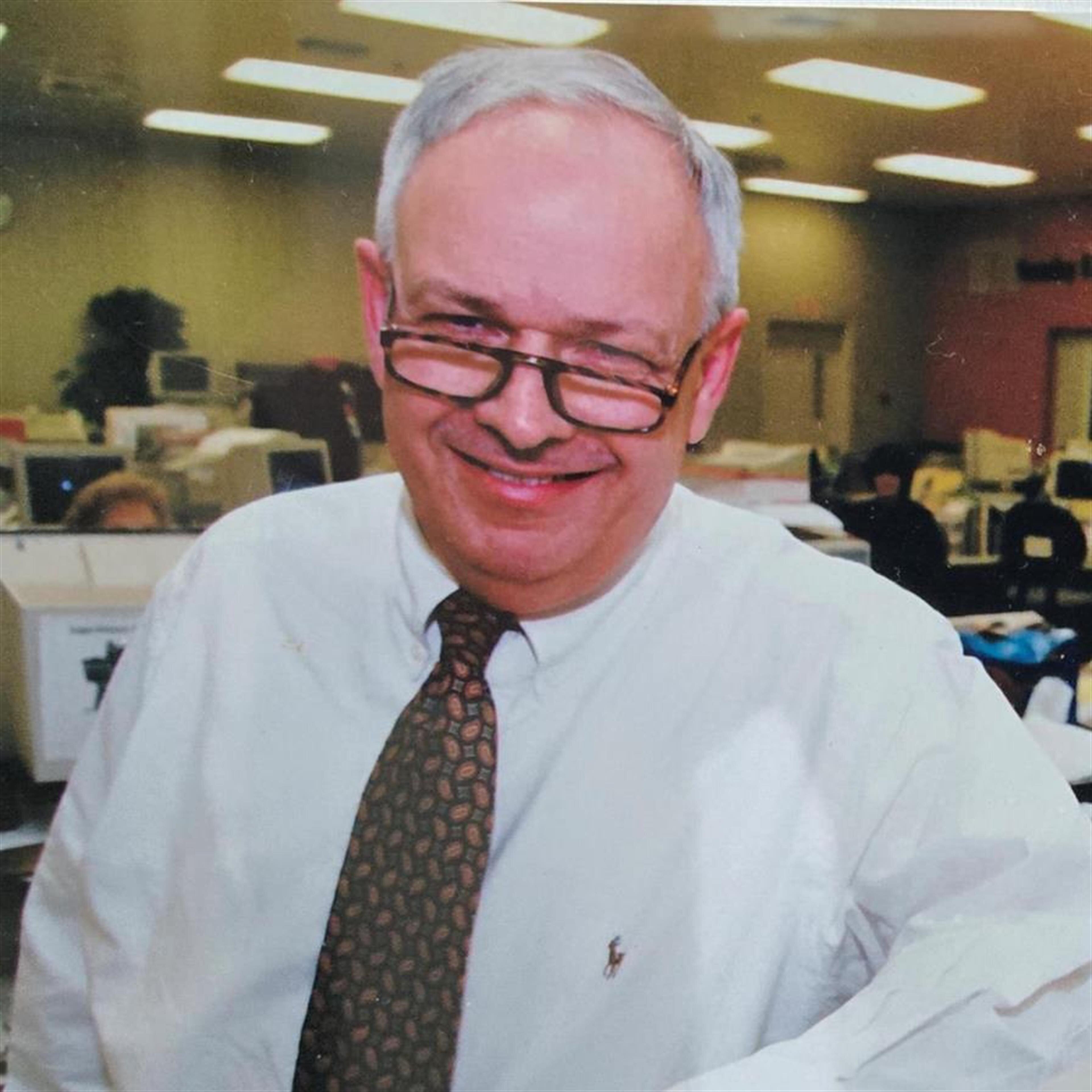 Daniel J Warner