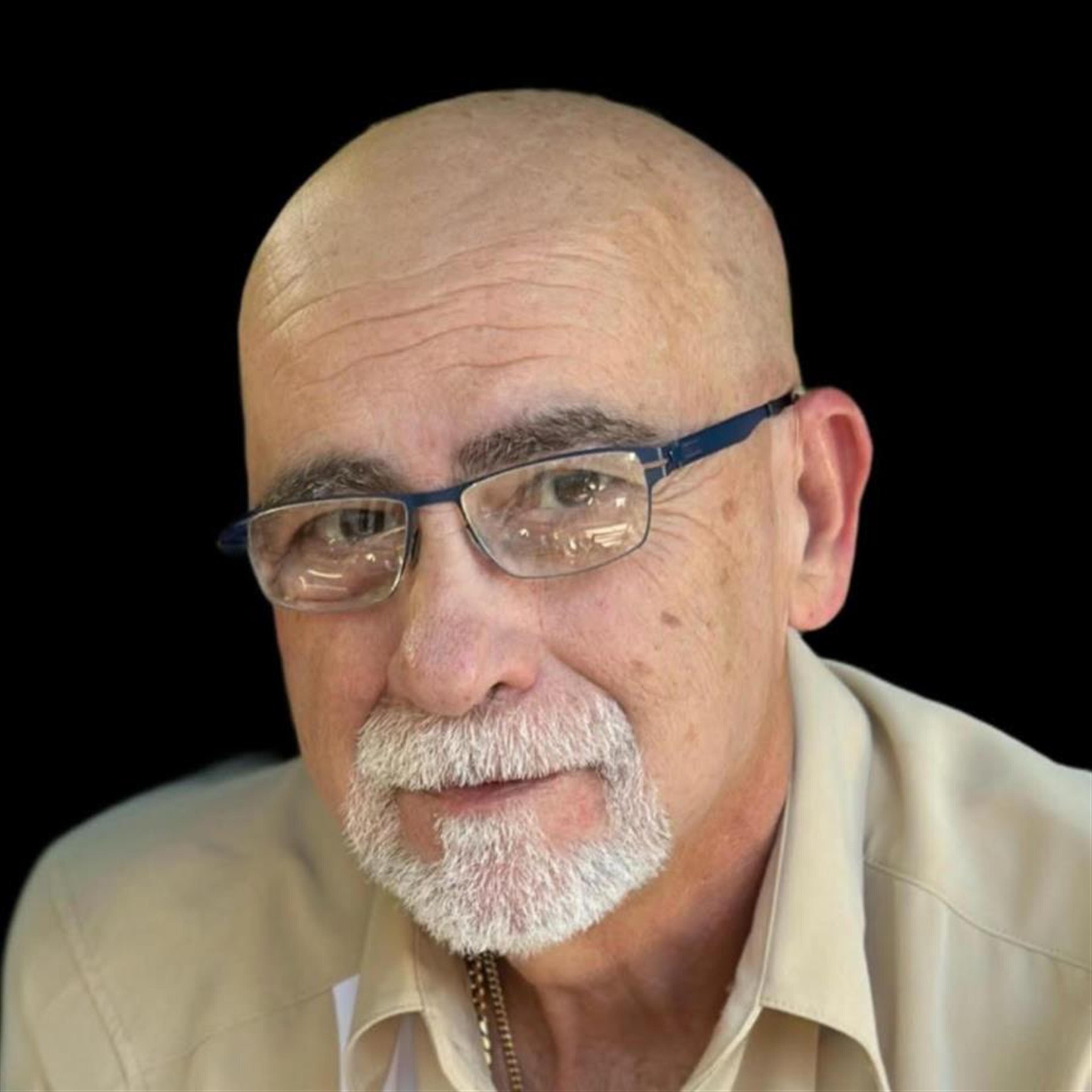 CARLOS F COMPTIS