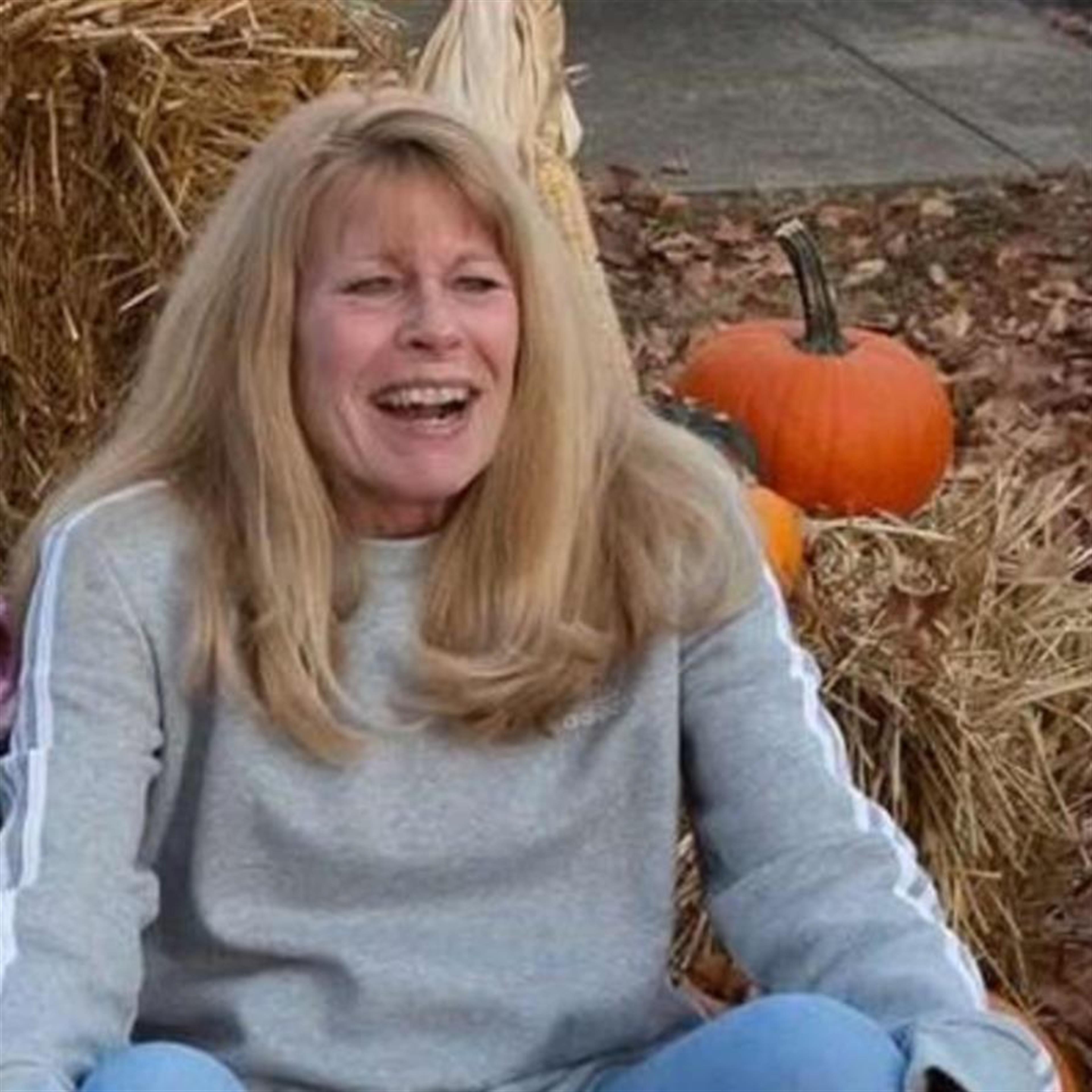Kathi Louise Lallathin