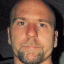 Johnny C. "John"  Saunders
