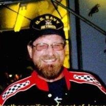 John E. Sevison