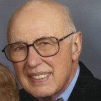Dr. Travis E. Morgan