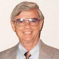 Norman E.  Wells