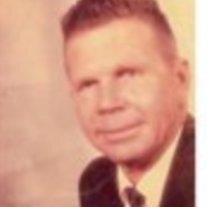 Claude E. Kuhn