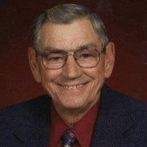 Claude E. West