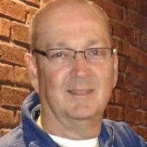 Mark L. Thomas