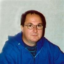 Timothy M.  Simmons