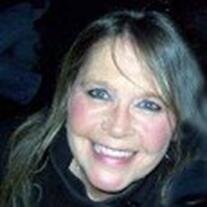 Debbie West