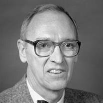 James W.  Conine