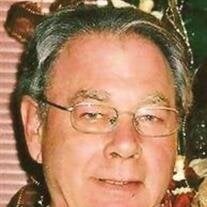 Dennis L. "Denny" Hamann
