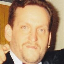 Chris A.  Woods