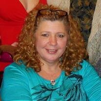 Ms.  Laura Moore