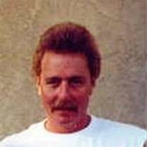 Ken L. Miller
