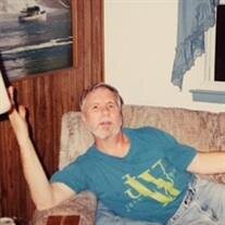 James E.  Theisen
