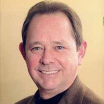 James F. (Jim)  Tuman