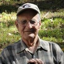 Claude P.  Thomas