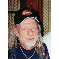 Kenneth L. "Ken" Marston