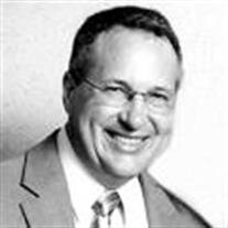 Greg J. Adamich