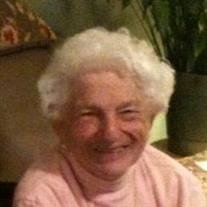 Joan T Muckelston