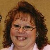 Christine A. Dora