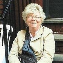 Ms. Elsie M. Holland