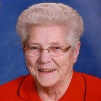 Collette M Benson