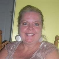 Debra L West