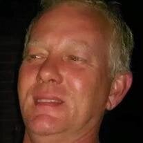 Mark  E. Gilbert