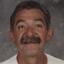 Joe C.  Sisneros