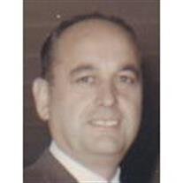 John E. Massirio