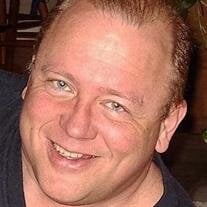 Mark E. Miller