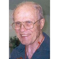 Malcolm E. Real
