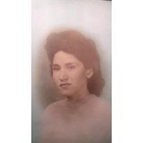 Ofelia E. Torres