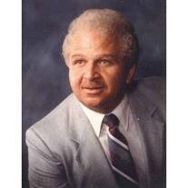 Dr. Charles R. Honore