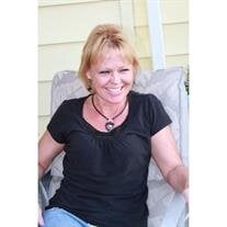Tina M. Reeves Dell