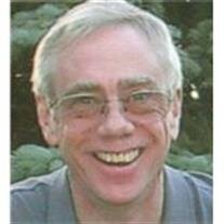 Greg E. Johnson