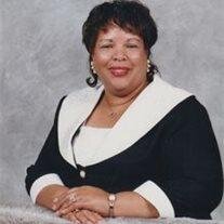 MINNIE L. BURNETT