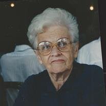 Julia L.  Devine