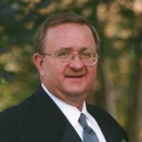 Gary E.  Cecil