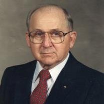 Lester E.  Hauer