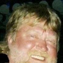 Mark E.  Heath