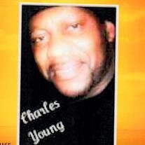 Charles E Young JR