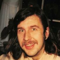 John  E.  Mills