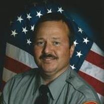 CHRIS L. HICKS