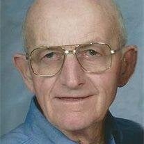 Raymond E.  Brennan