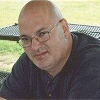 Michael E. Cauley