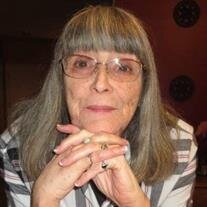 Laura E. Moore