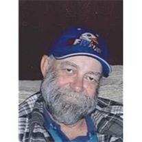 James E. (Gene) Laymon