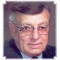 LESTER J. MELZER