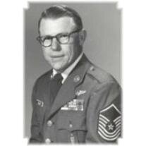 J.E.  TUCKER JR.